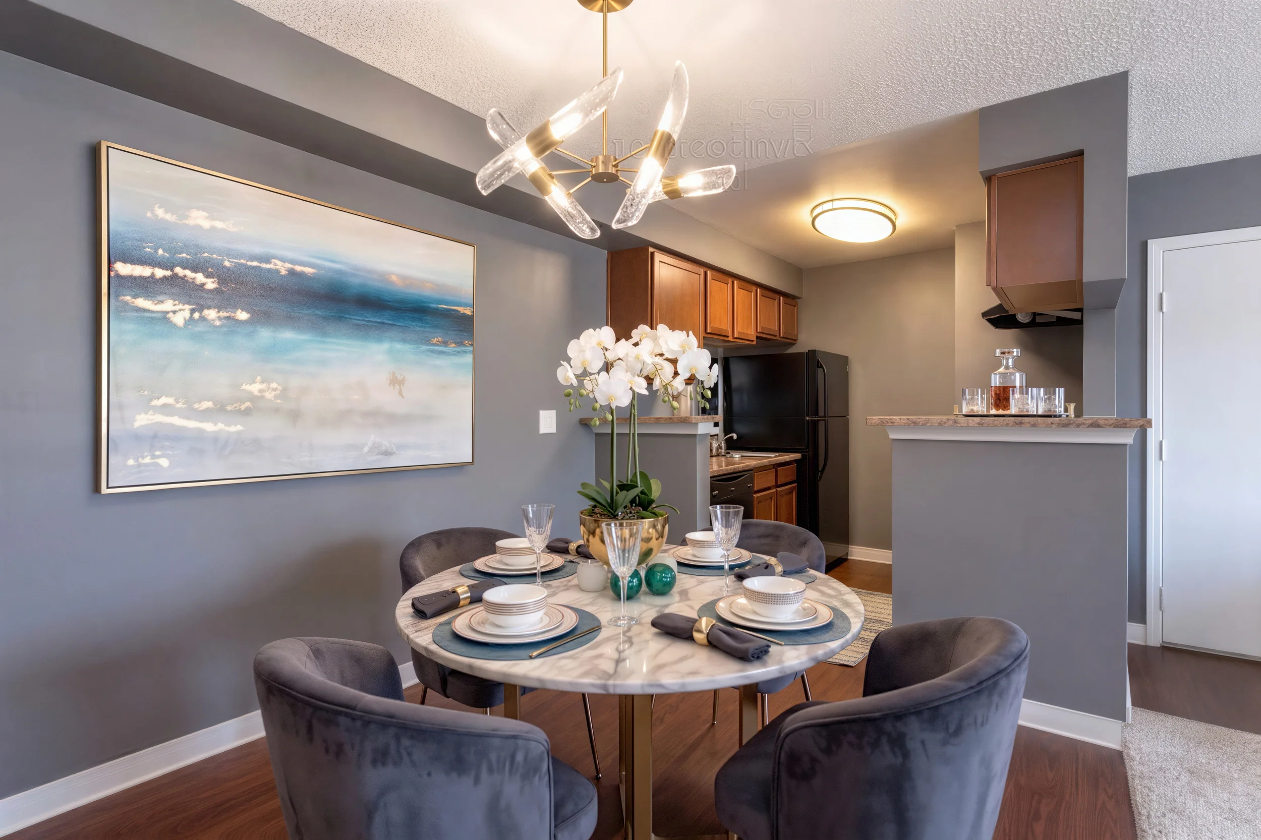 Open dining area beside the kitchen in a Cambrian Apartments home in Aurora, Colorado